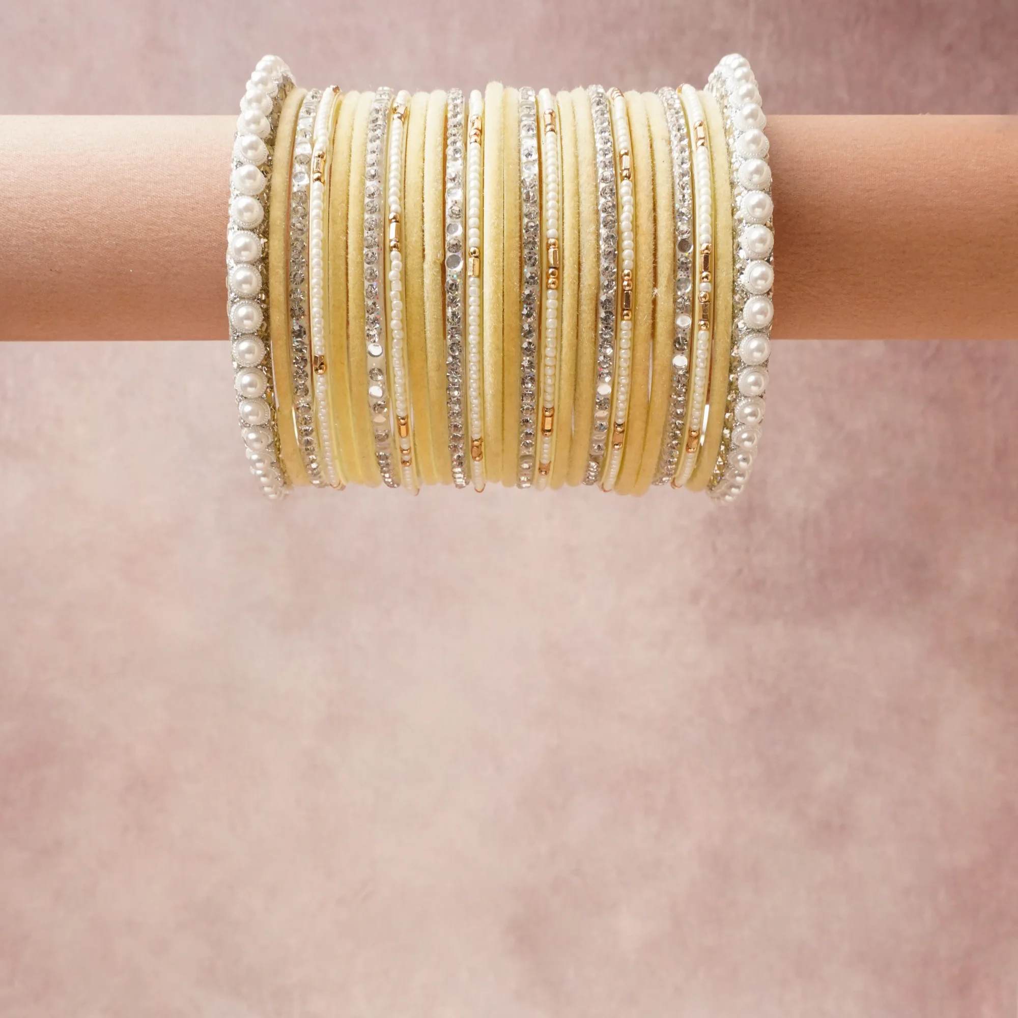 A grounding Pastel Yellow forms the heart of the set, while touches of White, Silver, Gold add charm.

A thoughtful composition of Velvet, Imitation Pearls, Rhinestones, Metallic Beads, Metal Base, designed to feel complete without being heavy.
Each element layers seamlessly, creating a look that is refined, wearable and quietly striking.